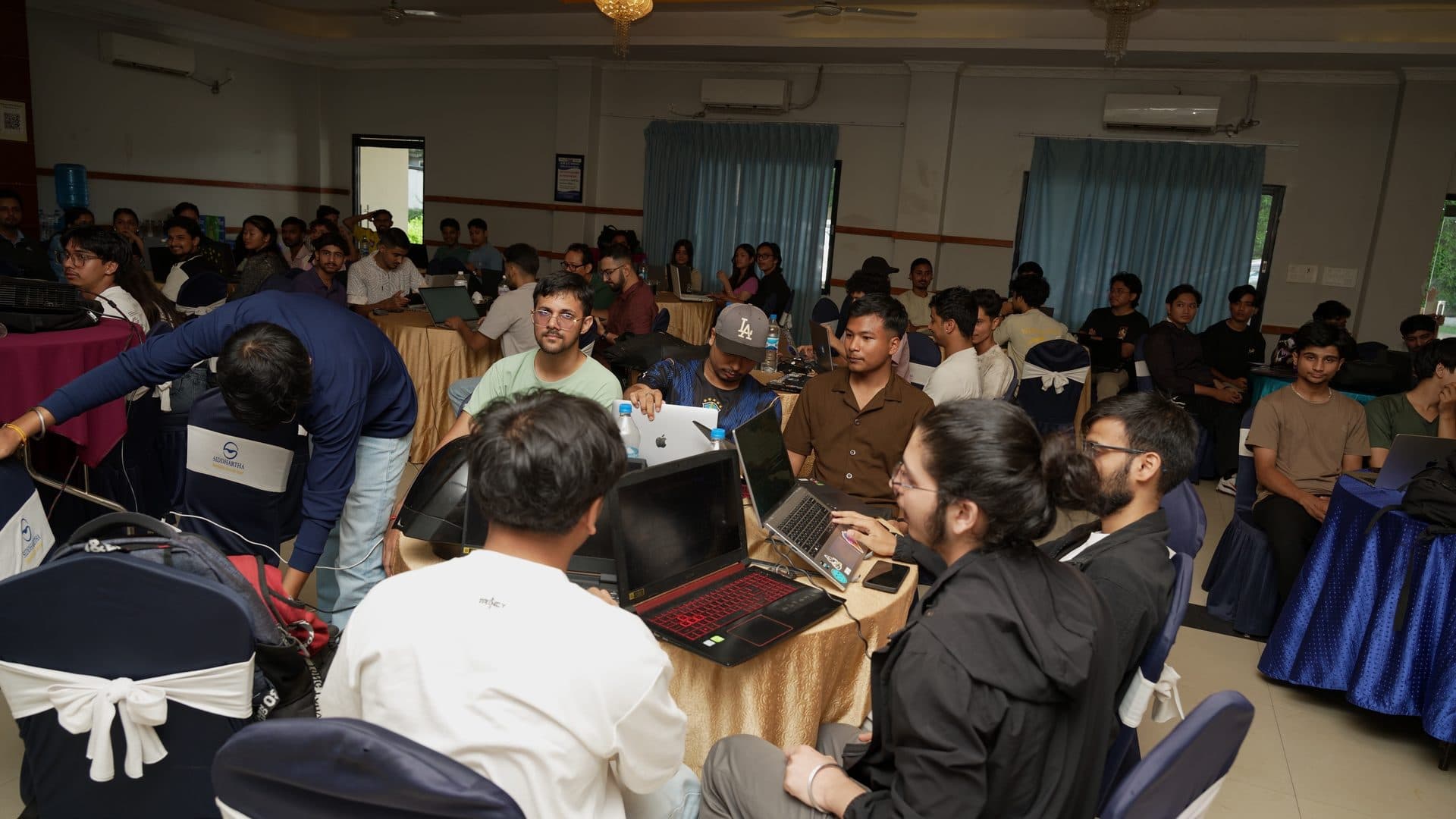 People gathered at a technology event in Nepal